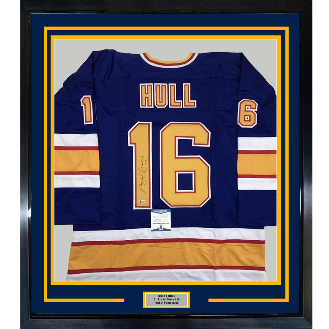 Framed Autographed/Signed Brett Hull 35x39 St. Louis Blue Jersey Beckett BAS COA