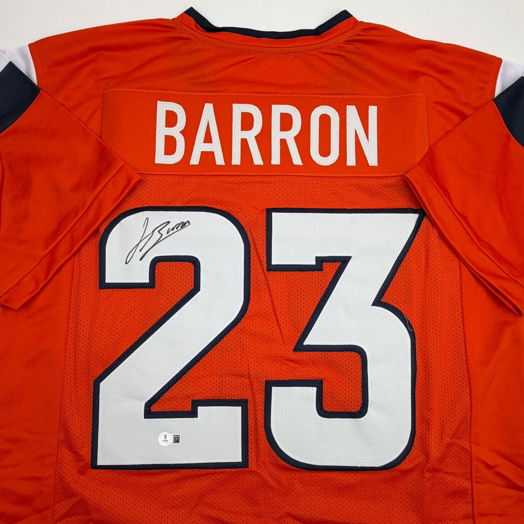 Autographed/Signed Jahdae Barron Denver Orange Football Jersey Beckett COA