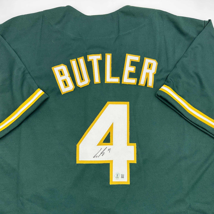 Autographed/Signed Lawrence Butler Oakland Green Jersey Beckett BAS COA