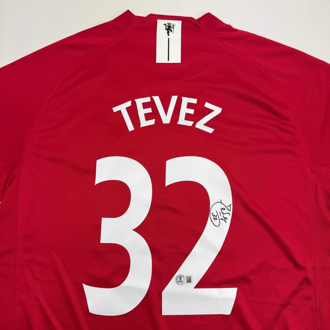 Autographed/Signed Carlos Tevez Manchester United Red Jersey Beckett COA