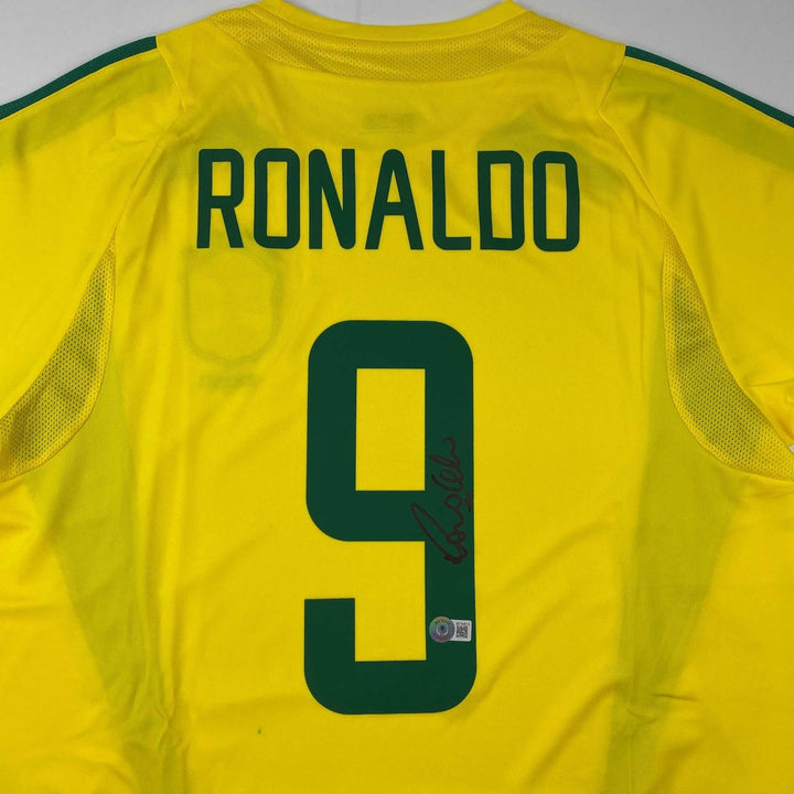 Autographed/Signed Ronaldo Nazario Brazil Yellow Jersey Beckett BAS COA