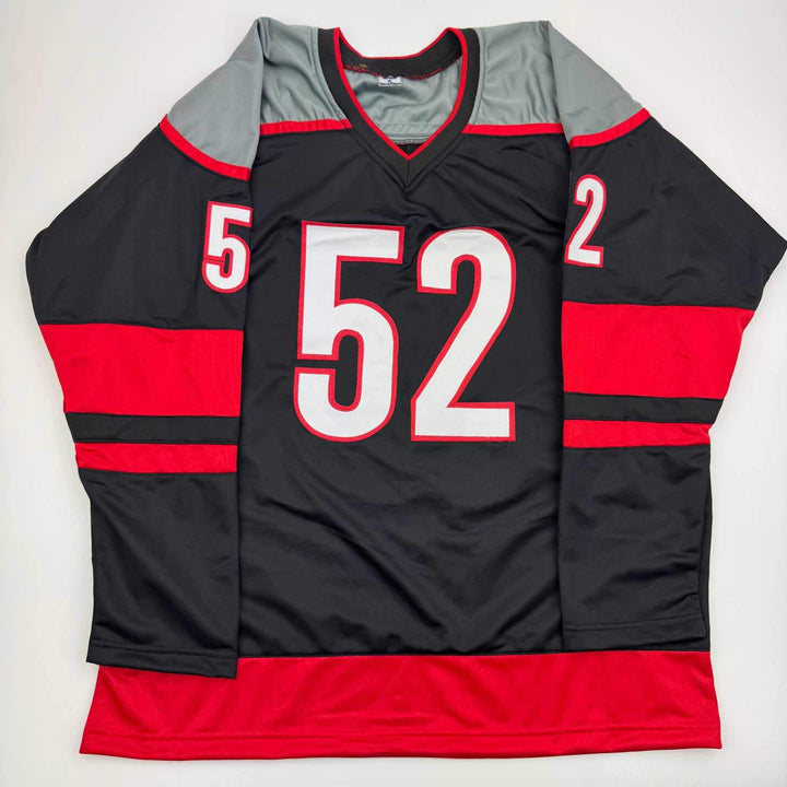 Autographed/Signed Pyotr Kochetkov Carolina Black Hockey Jersey JSA COA