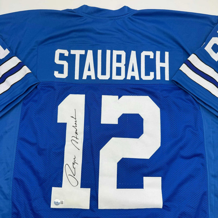 Autographed/Signed Roger Staubach Dallas Blue Jersey Beckett BAS COA