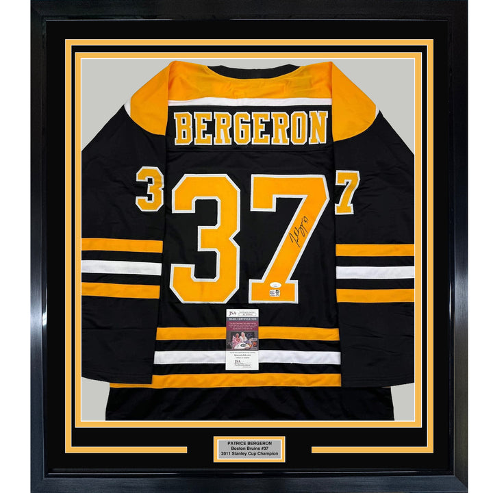 Framed Autographed/Signed Patrice Bergeron 33x42 Boston Black Jersey PSA/DNA COA