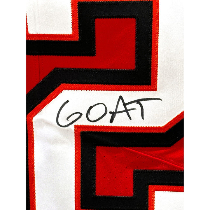 Tom Brady Autographed Tampa Bay Buccaneers Jersey Inscribed "GOAT" COA Fanatics