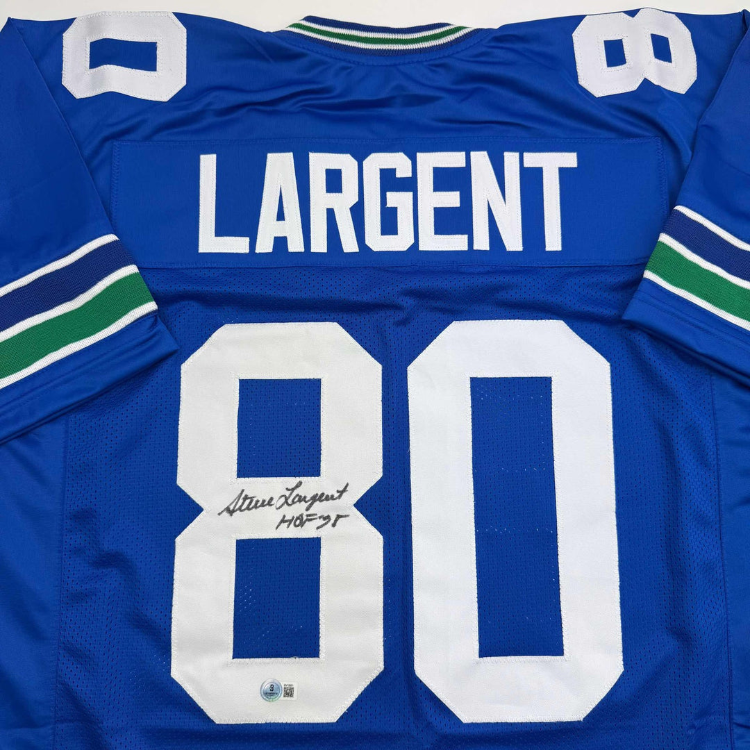 Autographed/Signed STEVE LARGENT HOF 95 Seattle Blue Football Jersey JSA COA