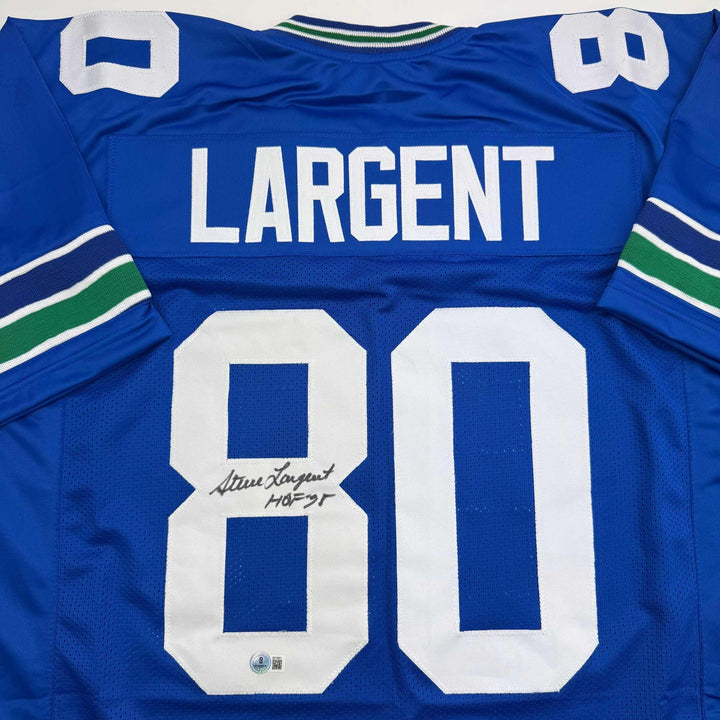 Autographed/Signed STEVE LARGENT HOF 95 Seattle Blue Football Jersey JSA COA