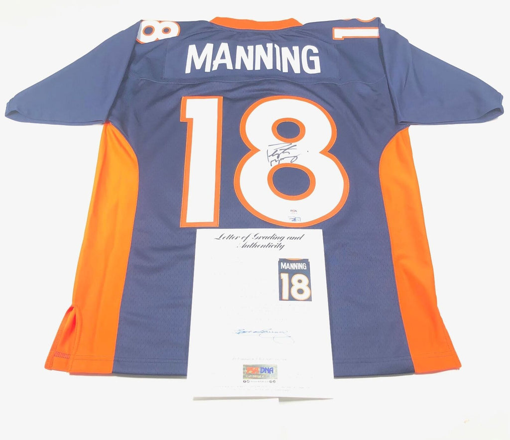 Sold at Auction: Peyton Manning signed and framed jersey PSA