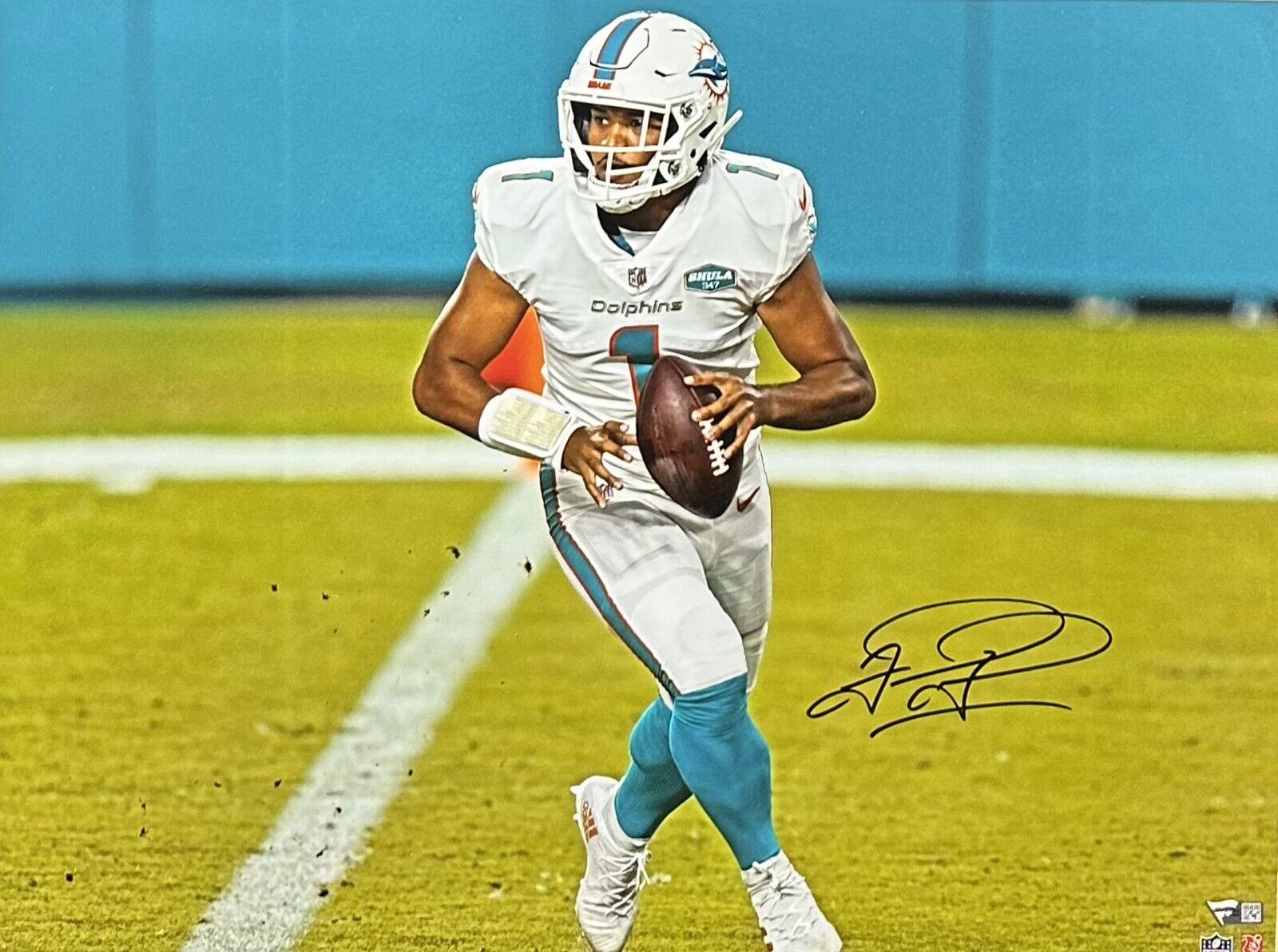 Tua Tagovailoa Miami Dolphins Fanatics Authentic Autographed 16 x 20  White Jersey Rolling Out Photograph