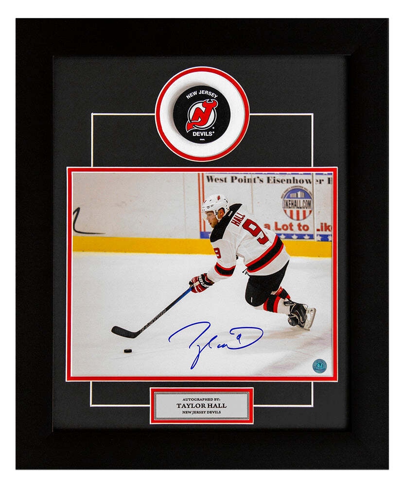 Taylor Hall New Jersey Devils Autographed Hockey Rush 20x24 Puck Frame Image 1