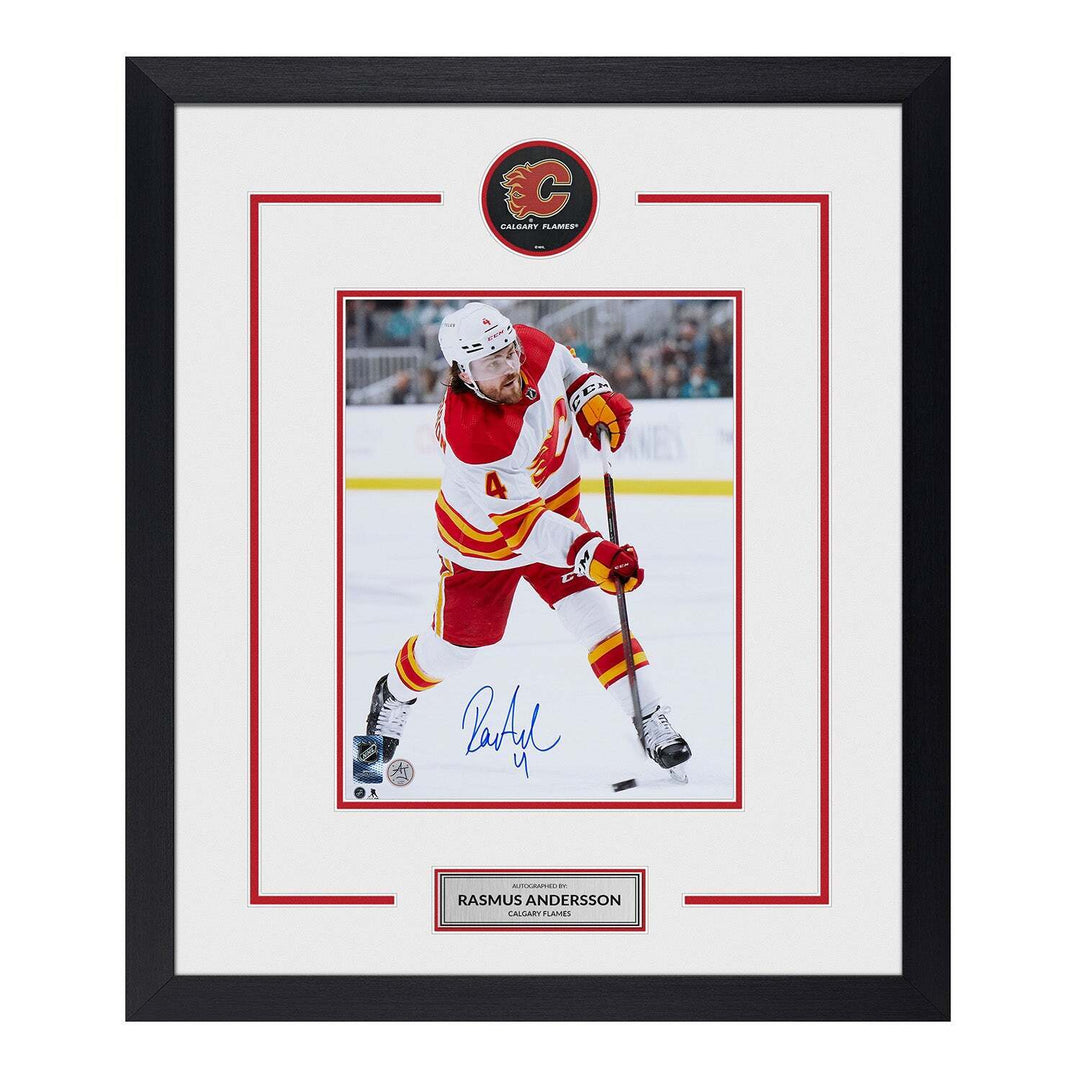 Rasmus Andersson Autographed Calgary Flames Puck Display 23x27 Frame Image 1