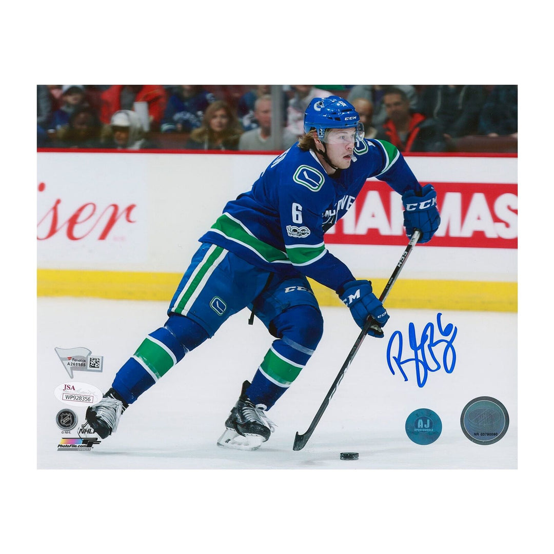 Brock Boeser Vancouver Canucks Autographed Puck Control 8x10 Photo Image 1