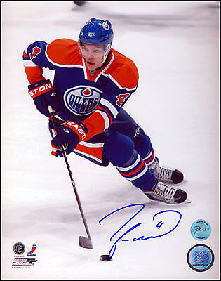 Taylor Hall Edmonton Oilers Signed Puck Control 8x10 Photo Image 1