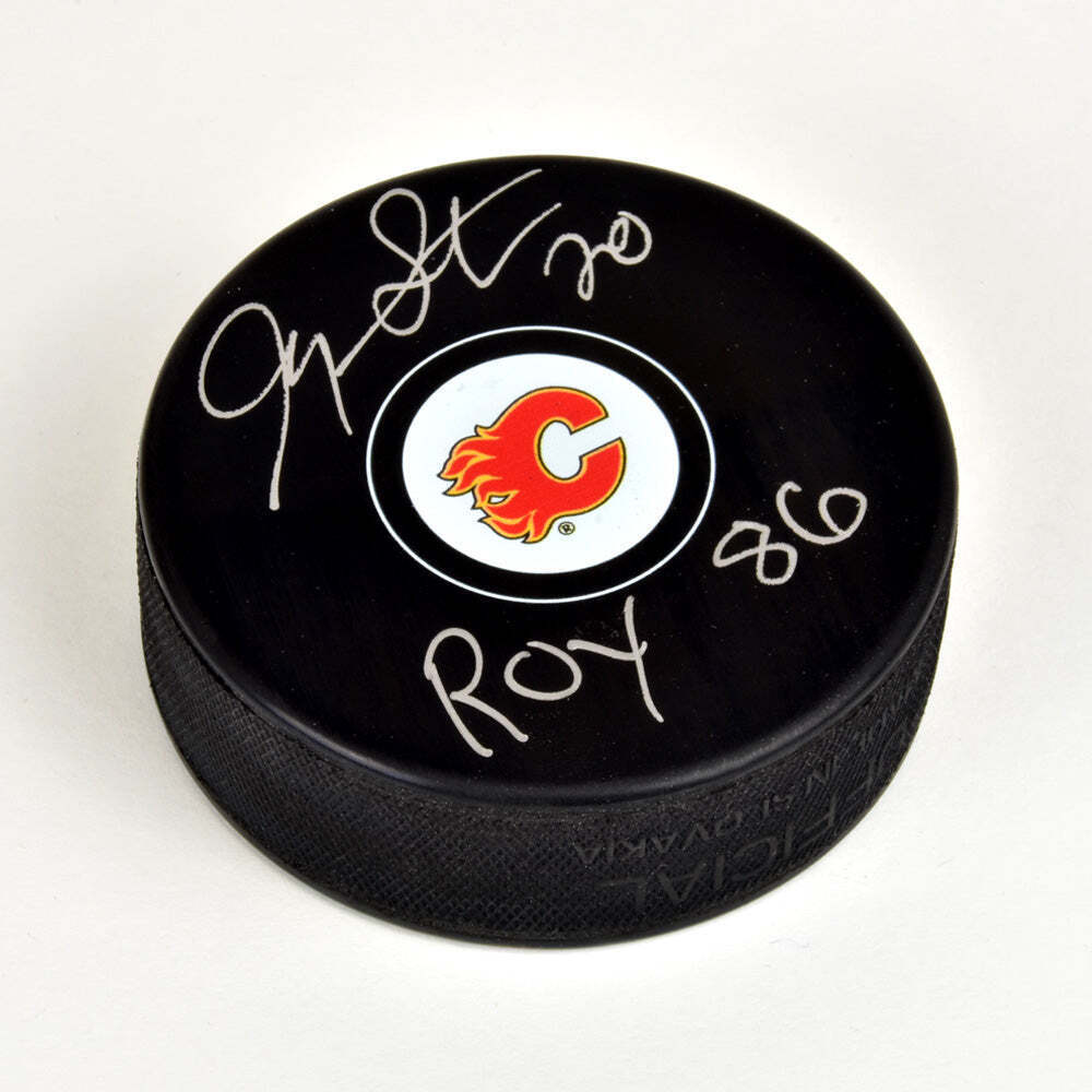 Gary Suter Calgary Flames Autographed Hockey Puck with ROY 86 Note Image 1