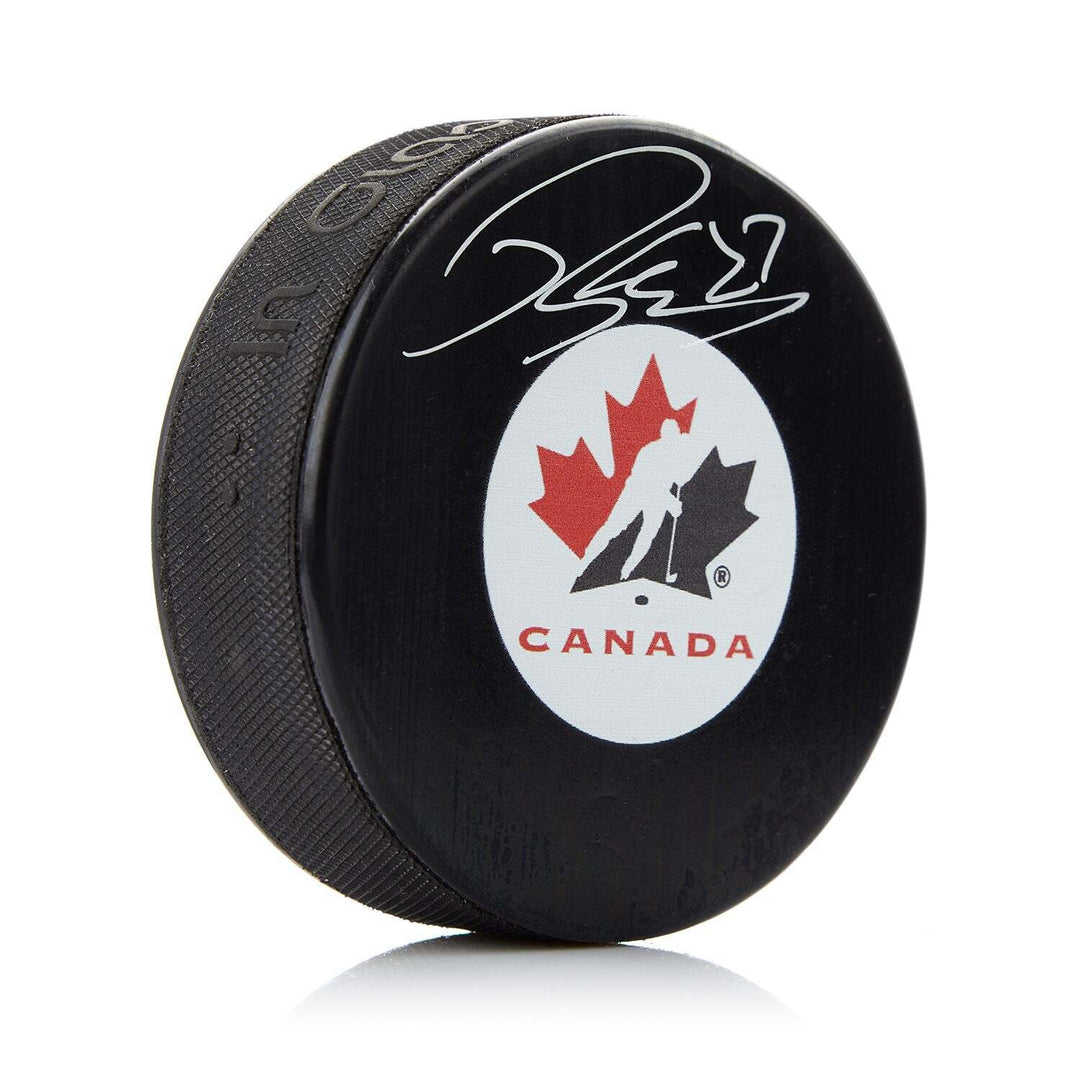 Robert Thomas Autographed Team Canada Hockey Puck Image 1