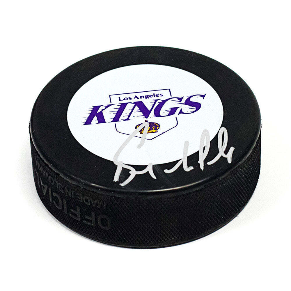 Bernie Nicholls Los Angeles Kings Autographed Purple Logo Hockey Puck Image 1