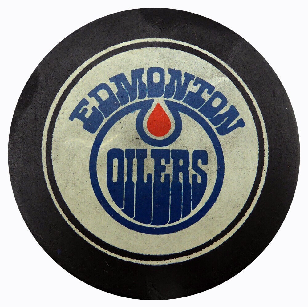 Unsigned Edmonton Oilers Vintage WHA Puck SKU #123623 Image 1